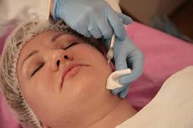 Woman undergoing a face botox injection